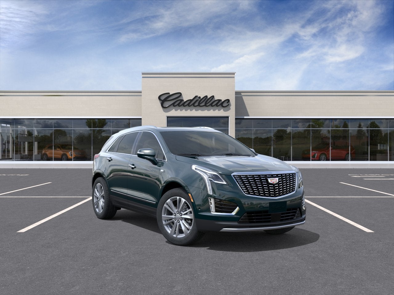 2026 Cadillac XT5 Premium Luxury in Emerald Lake Metallic — front three-quarter view