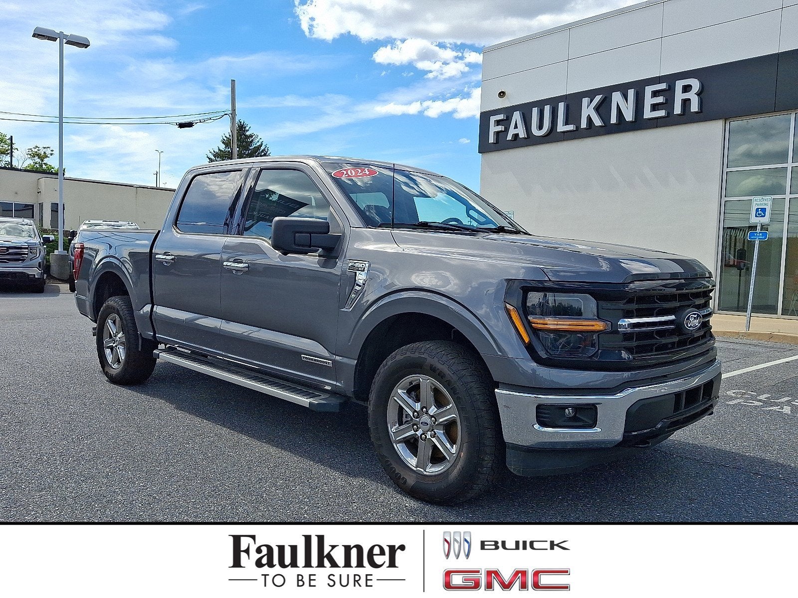 2024 Ford F-150 XLT in Carbonized Gray Metallic — front three-quarter view