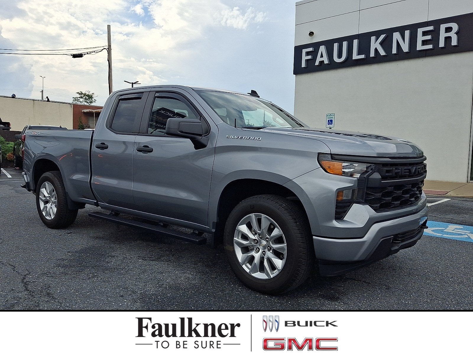 2023 Chevrolet Silverado 1500 Custom in Sterling Gray Metallic — front three-quarter view