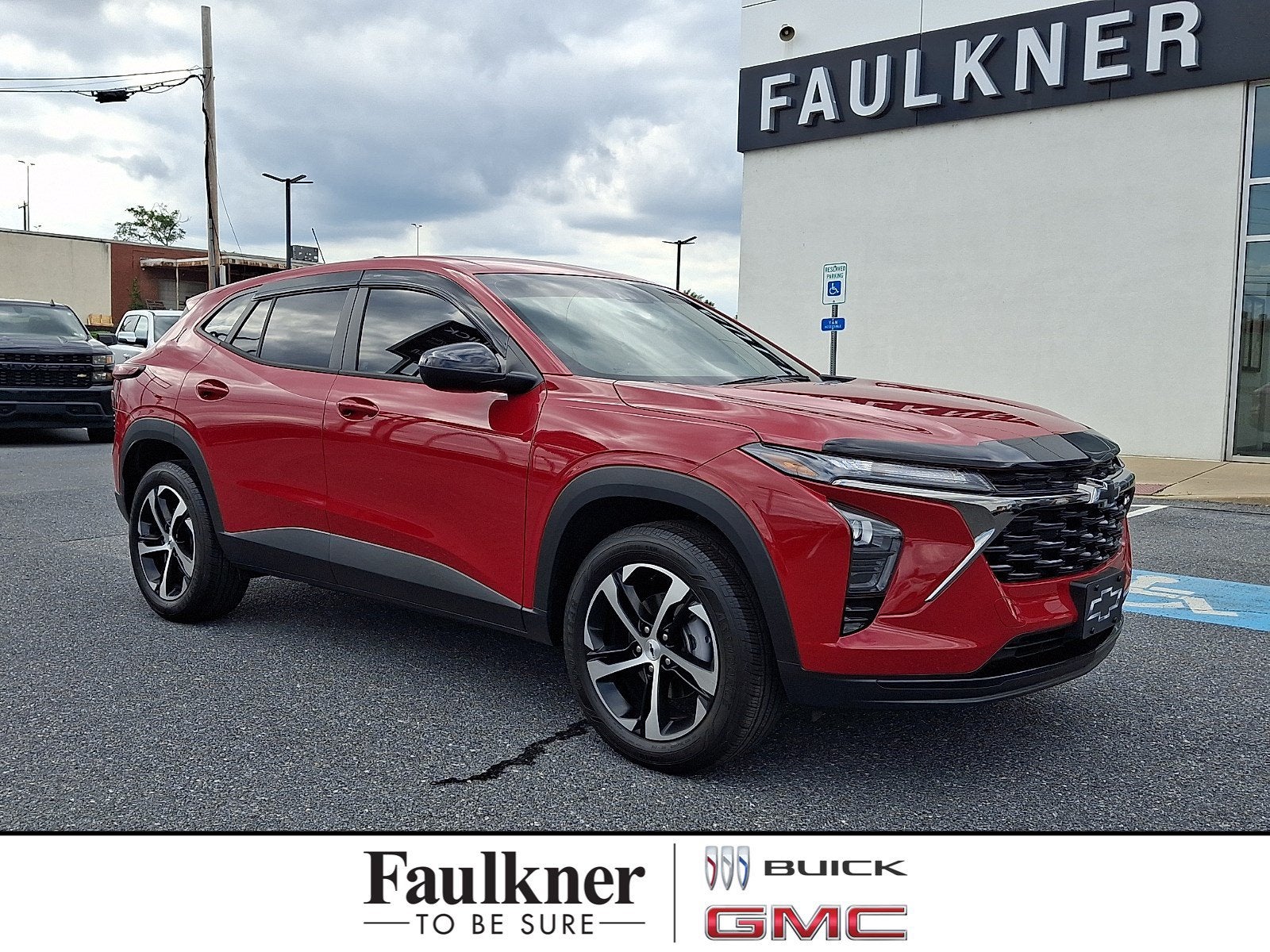 2026 Chevrolet Trax 1RS in Apex Red — front three-quarter view