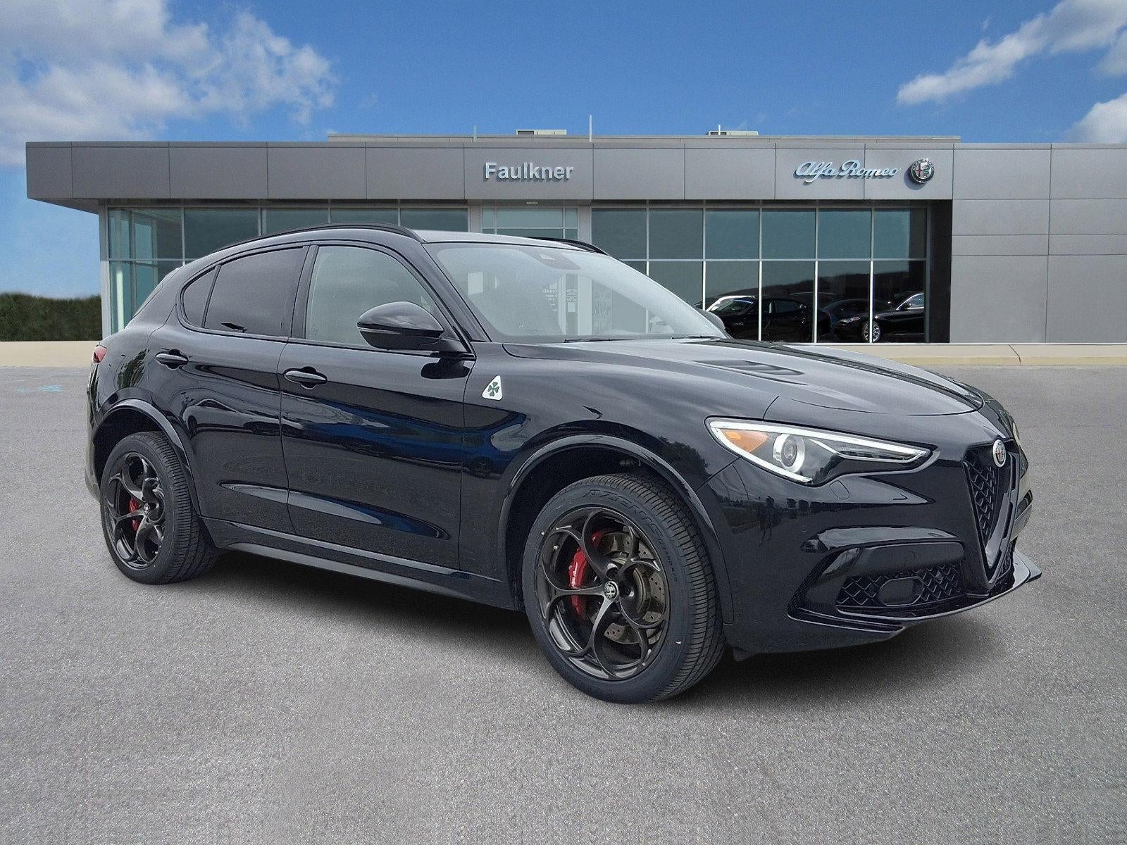 2022 Alfa Romeo Stelvio Quadrifoglio AWD in Vulcano Black Metallic — front three-quarter view