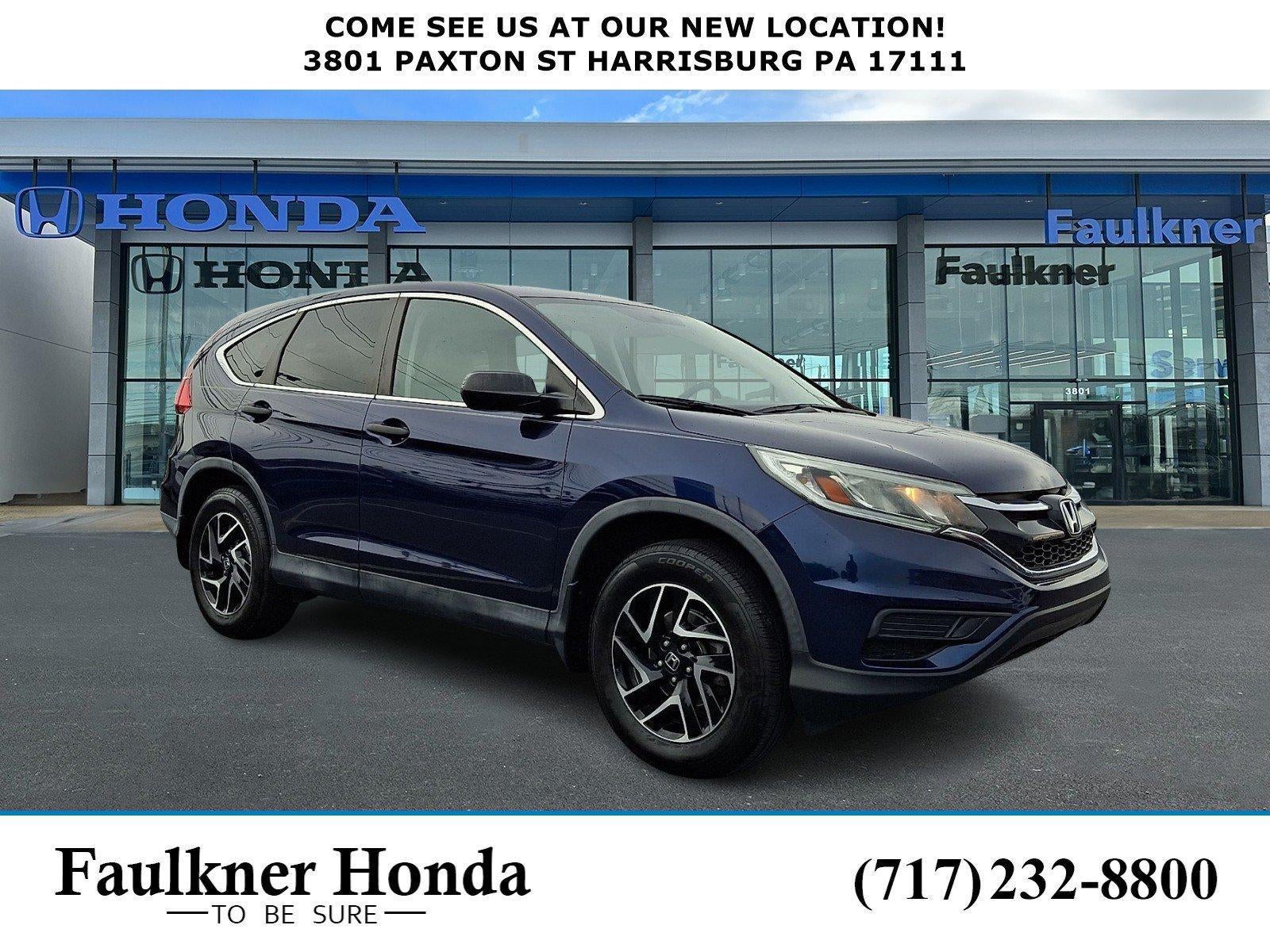 2016 Honda CR-V SE AWD in Obsidian Blue Pearl — front three-quarter view