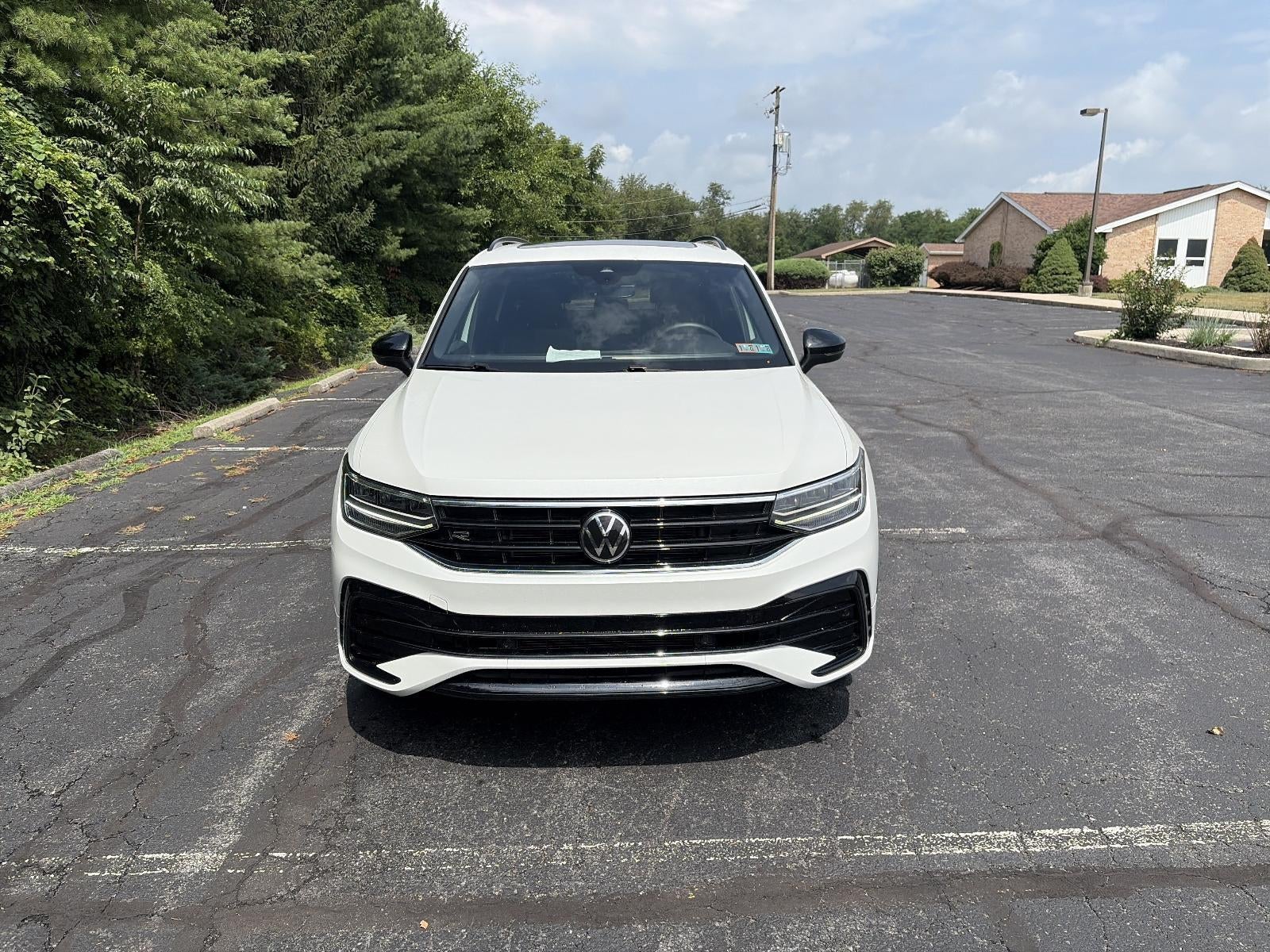 2023 Volkswagen Tiguan 2.0T SE R-Line Black 4MOTION in Pure White — front three-quarter view
