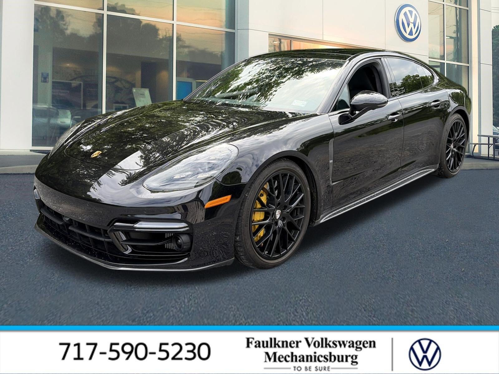 2022 Porsche Panamera Turbo S AWD in Jet Black Metallic — front three-quarter view