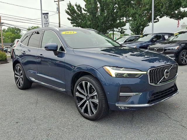 2023 Volvo XC60 B5 AWD Ultimate Bright Theme in Denim Blue Metallic — front three-quarter view