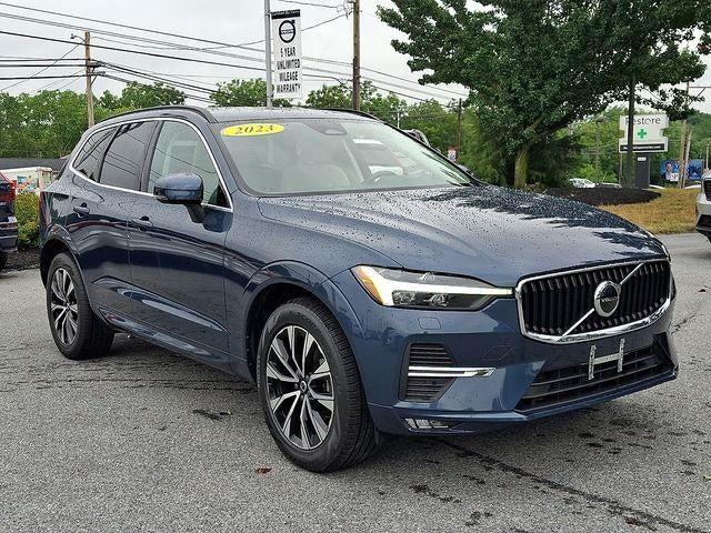2023 Volvo XC60 B5 AWD Core in Denim Blue Metallic — front three-quarter view