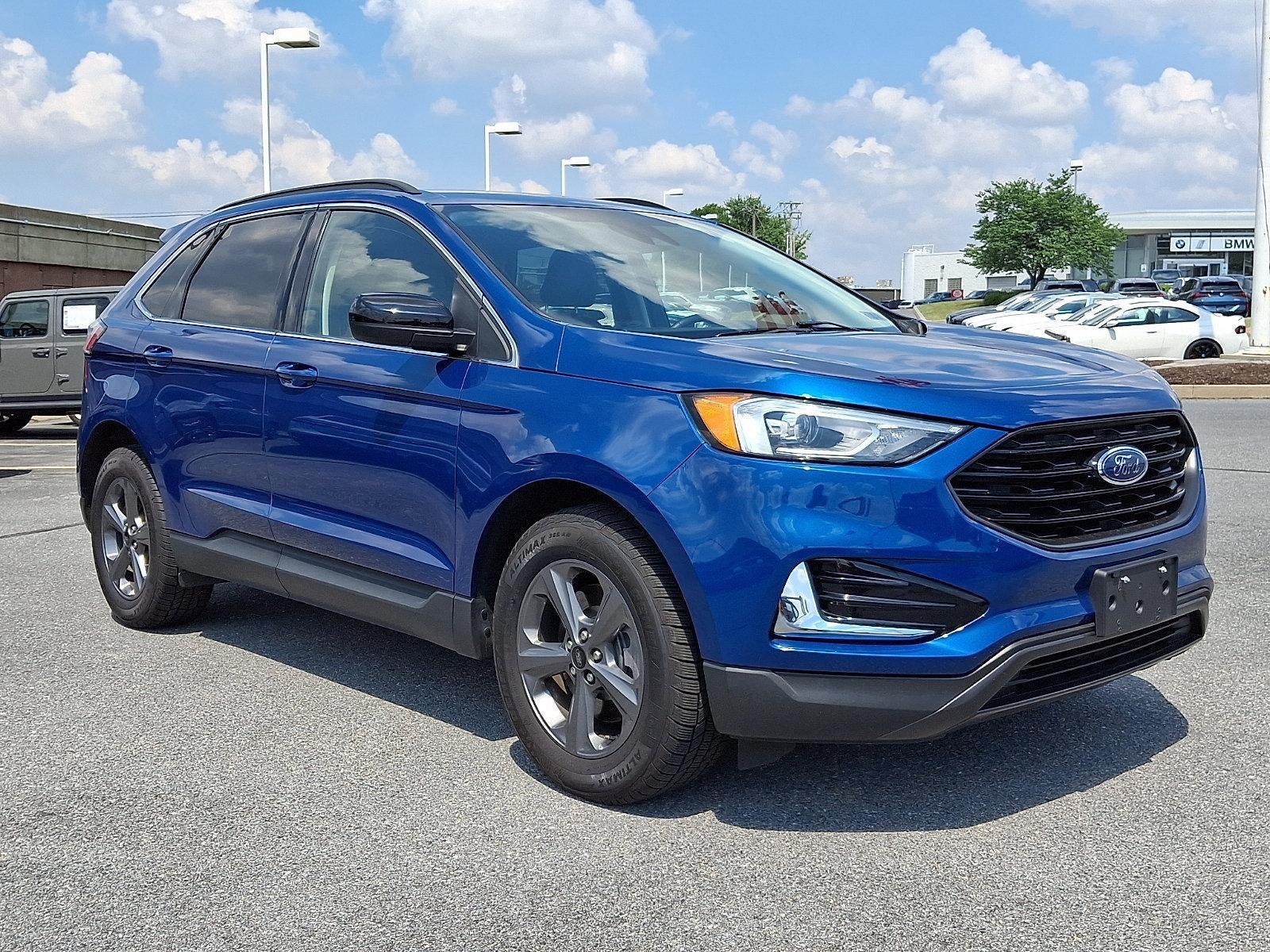 2022 Ford Edge SEL AWD in Blue Metallic — front three-quarter view