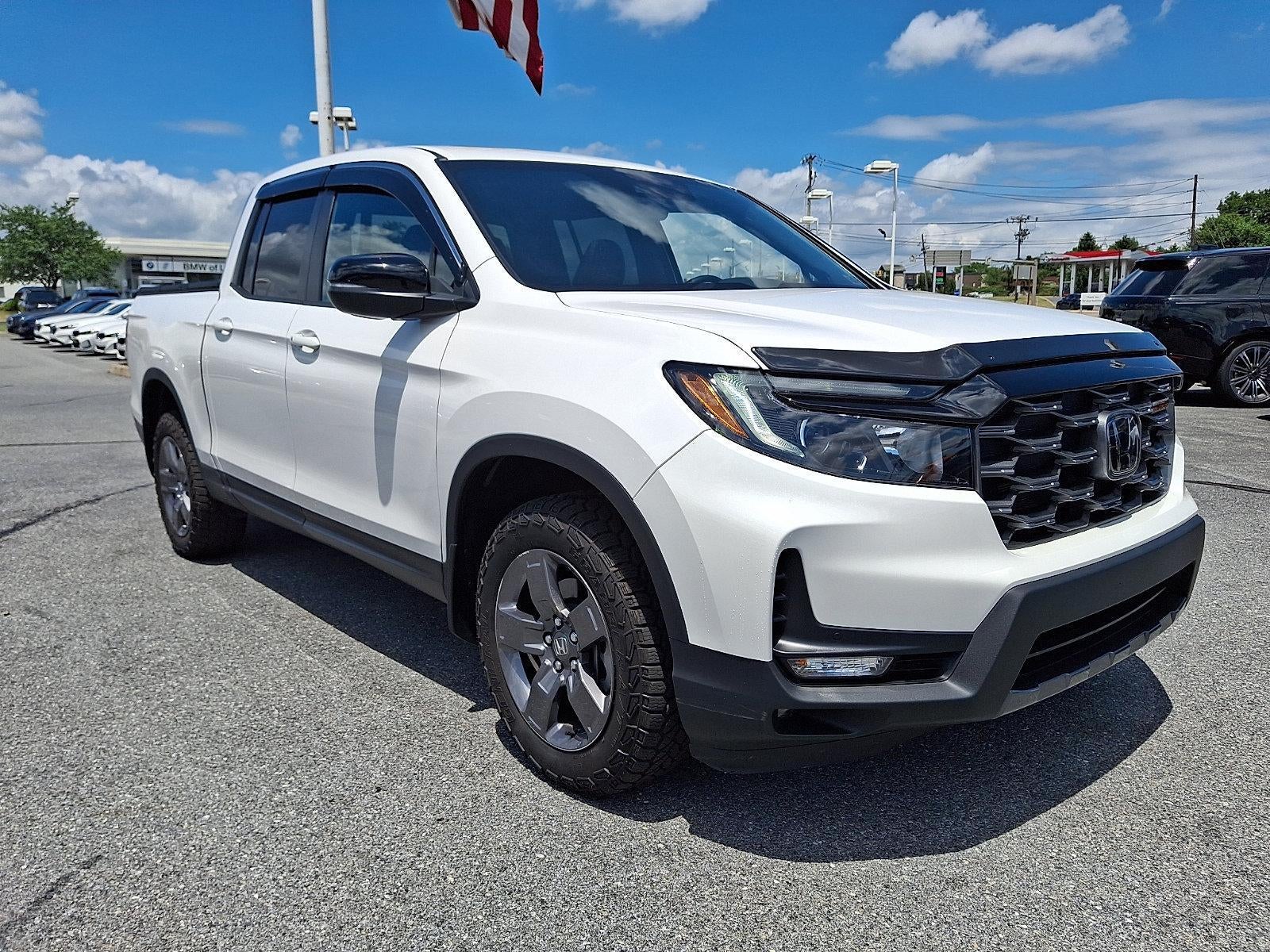 2024 Honda Ridgeline TrailSport AWD in Platinum White Pearl — front three-quarter view