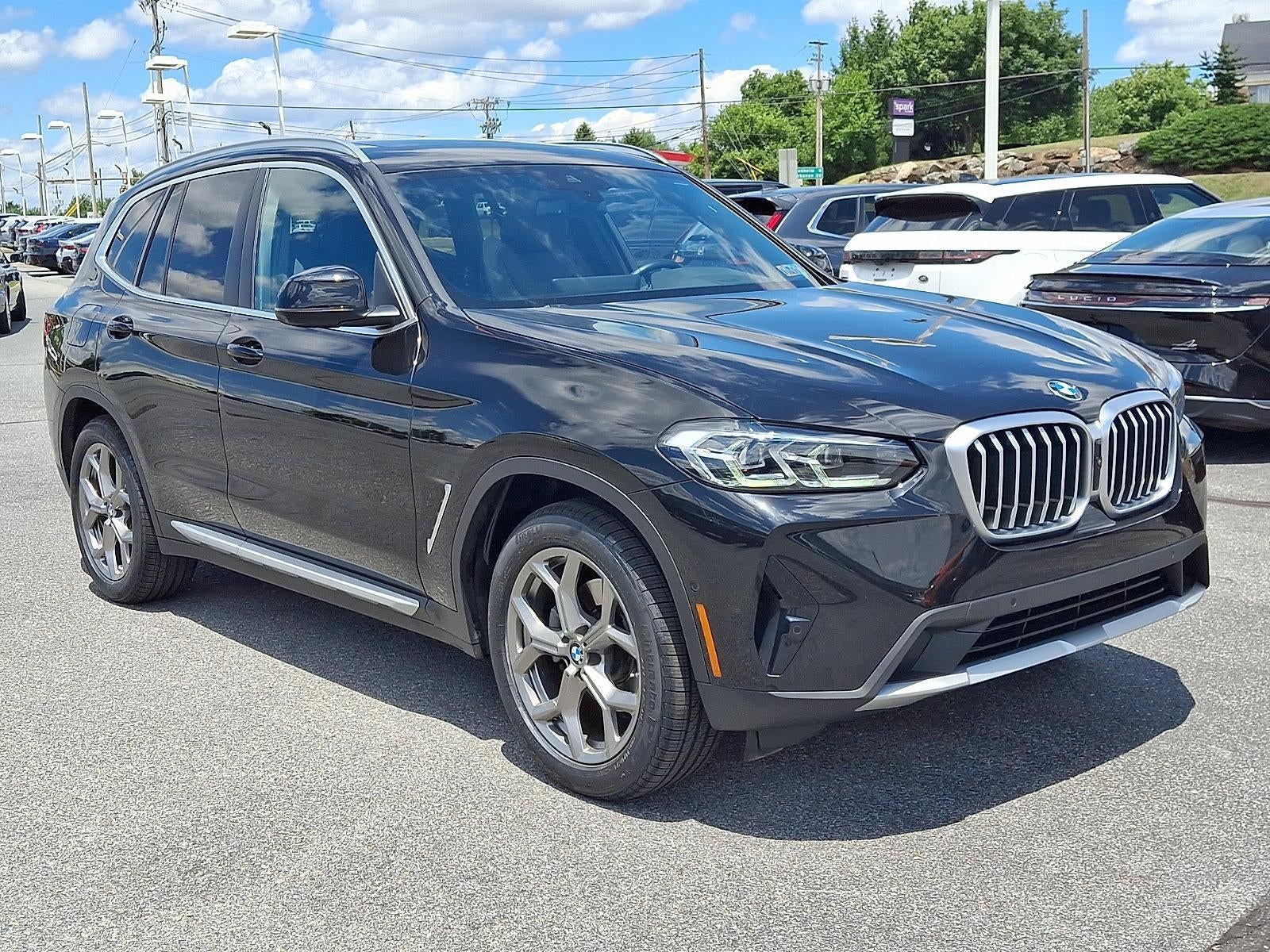 2024 BMW X3 xDrive30i Sports Activity Vehicle in Black Sapphire Metallic — front three-quarter view