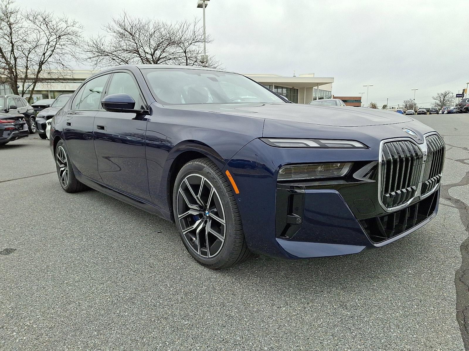 2023 BMW 760i xDrive Sedan in Tanzanite Blue II Metallic — front three-quarter view