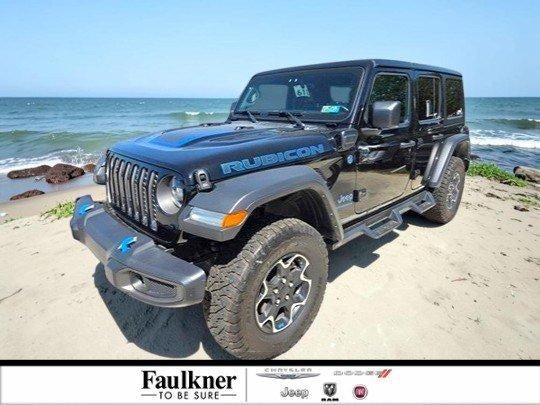2023 Jeep Wrangler 4xe Rubicon 4x4 in Black Clearcoat — front three-quarter view