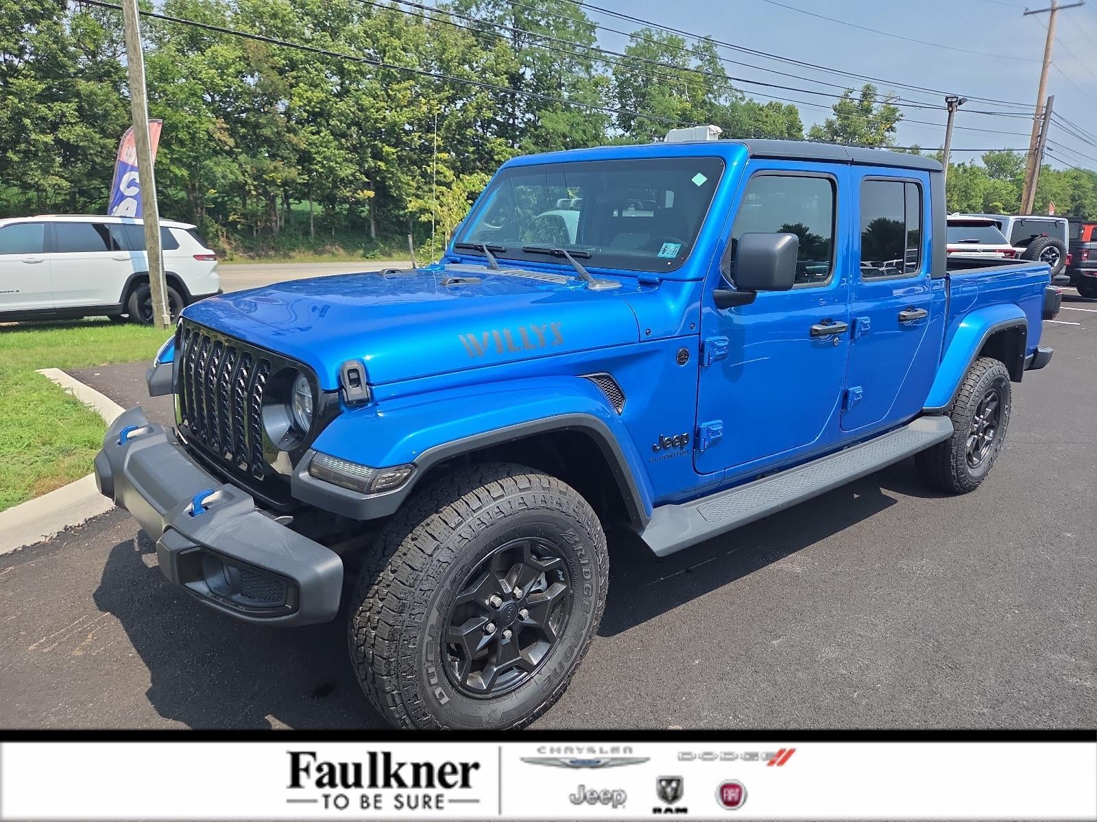 2021 Jeep Gladiator Willys 4x4 in Hydro Blue Pearlcoat — front three-quarter view