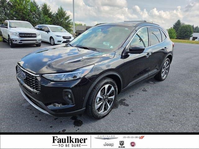 2024 Ford Escape Platinum AWD in Agate Black Metallic — front three-quarter view