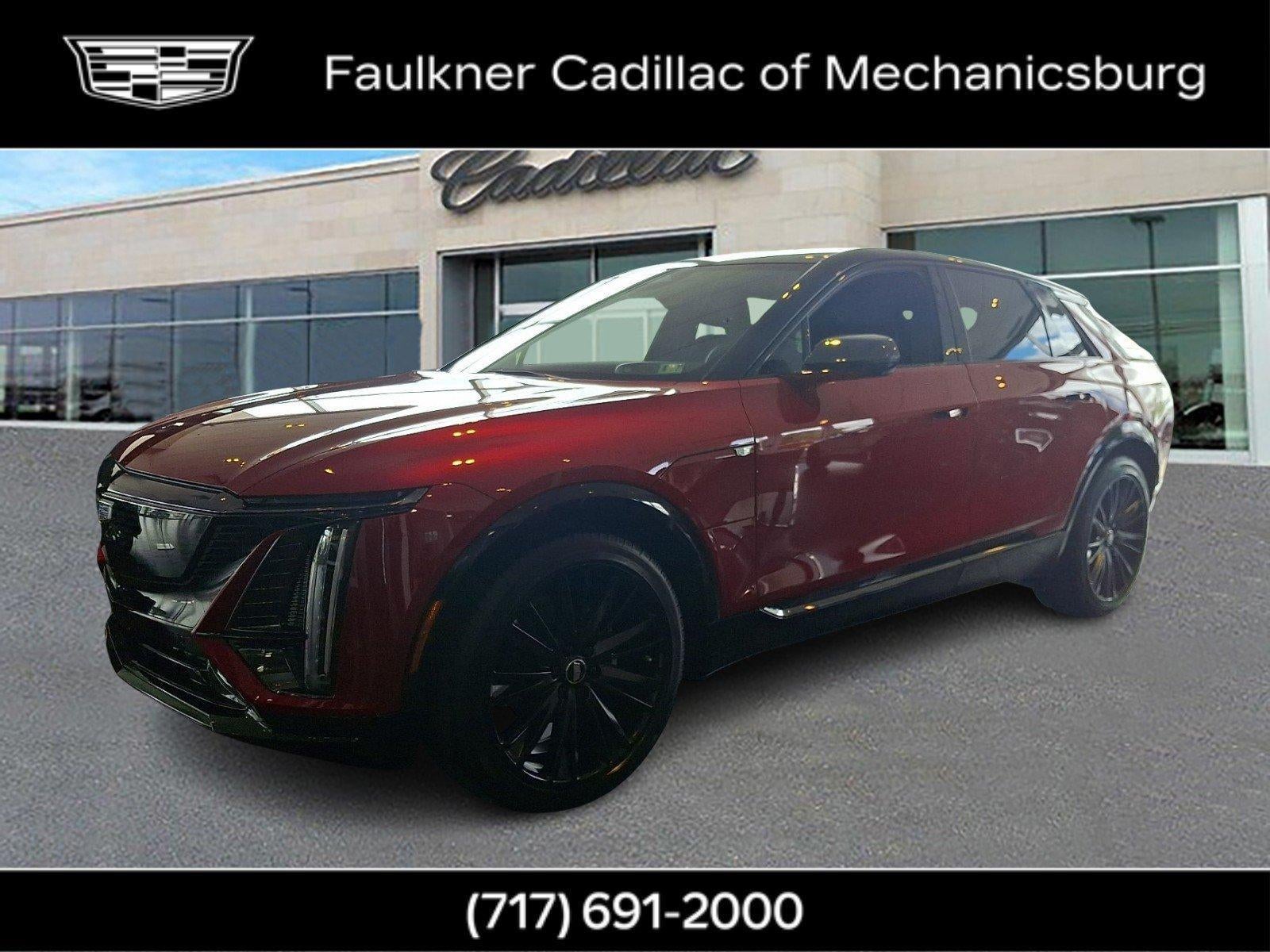 2026 Cadillac LYRIQ Sport in Radiant Red Tintcoat — front three-quarter view