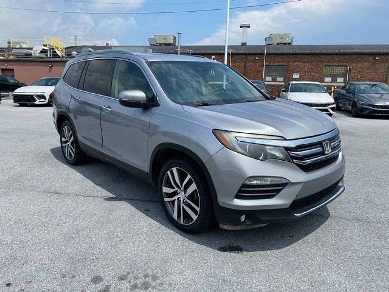 2017 Honda Pilot — rear three-quarter view