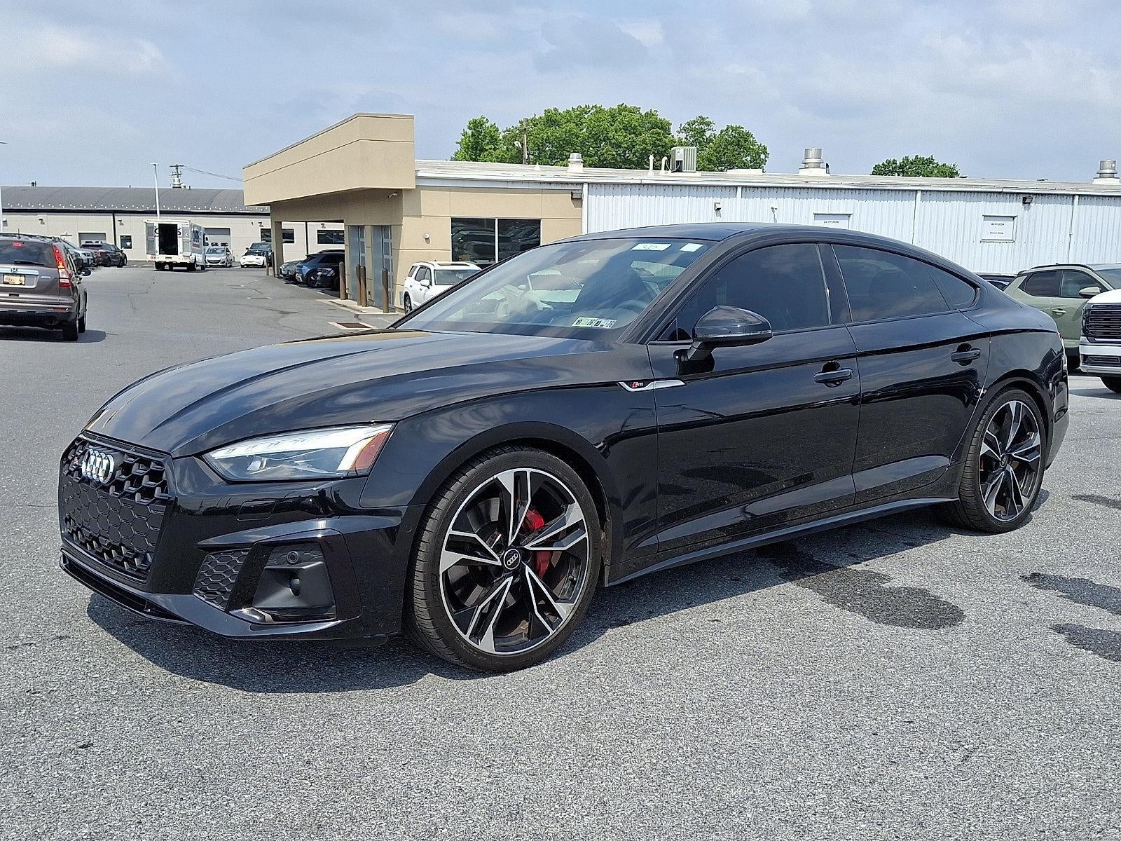 2022 Audi S5 Sportback Prestige in Mythos Black Metallic — front three-quarter view